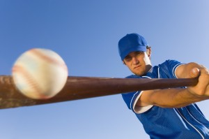 Batter Hitting Baseball